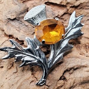 Vintage Scottish Thistle Brooch With Faceted Amber Glass Stone